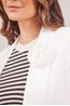 BLAZER-COM-BROCHE-FLOR